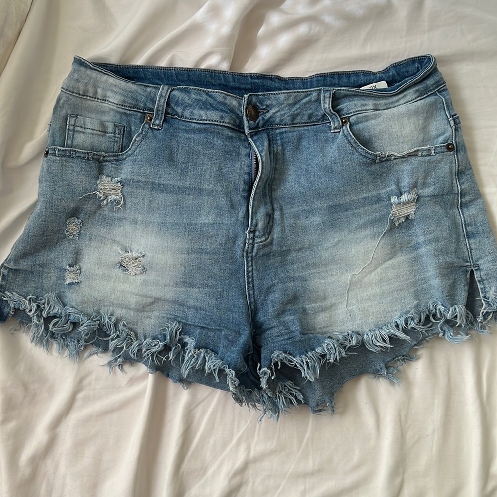 Distressed denim shorts